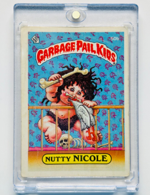 Photo 1 of 811668…vintage 1985 Garbage Pail Kids Nutty Nicole card  in hard plastic case 