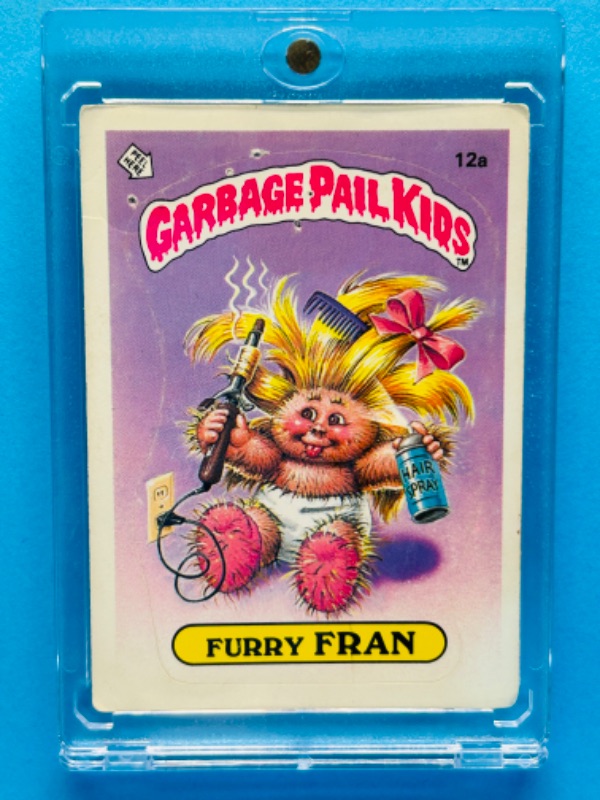 Photo 1 of 811671…wear on corners-vintage 1985 garbage pail kids Furry Fran sticker card  in hard plastic case  