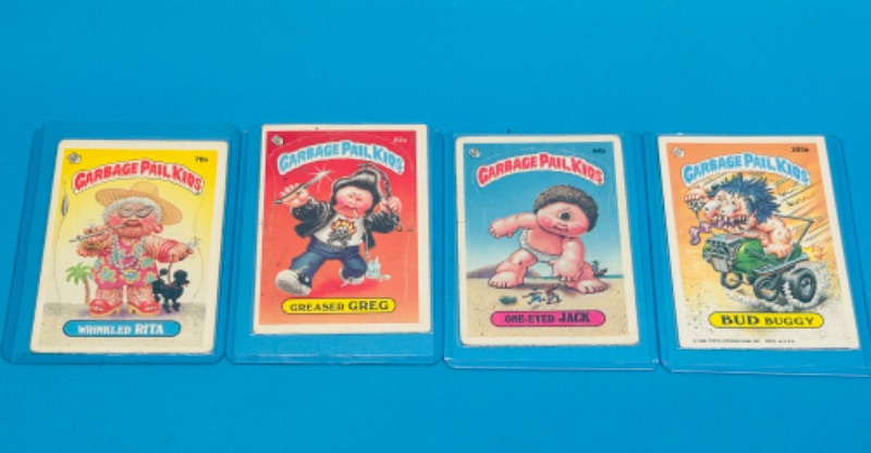 Photo 2 of 811684… 4 vintage 1985/86 garbage pail kids sticker cards in hard plastic sleeves 