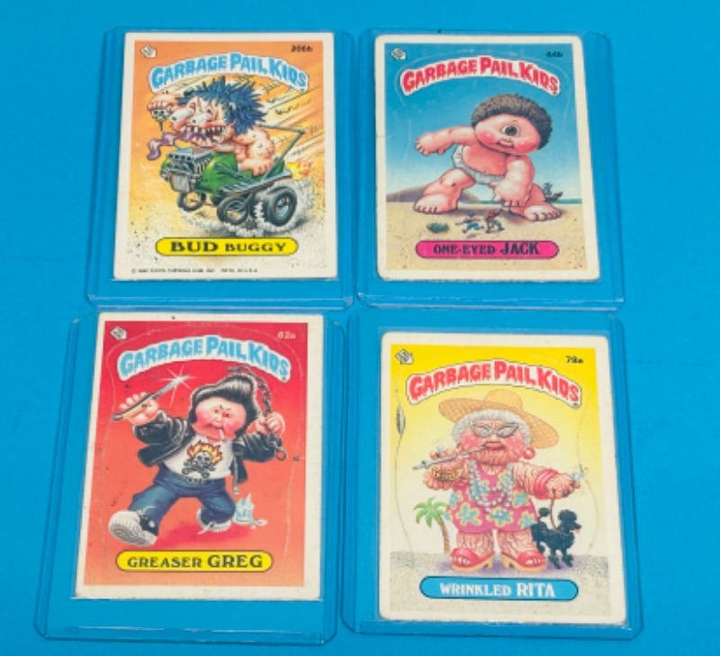 Photo 1 of 811684… 4 vintage 1985/86 garbage pail kids sticker cards in hard plastic sleeves 