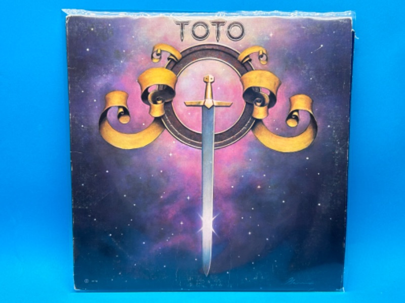 Photo 1 of 811722…Toto  vinyl record 33 rpm in plastic sleeve 