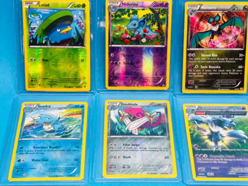 Photo 2 of 811741…8 Pokémon reverse holo and holo cards in hard plastic sleeves 