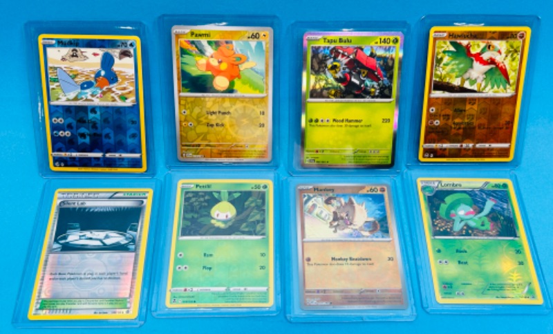 Photo 1 of 811747…8 Pokémon reverse holo and holo cards in hard plastic sleeves 