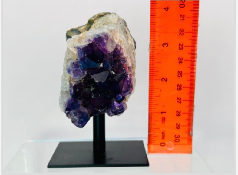 Photo 2 of 811822…  4” amethyst crystal rock on stand-height includes stand 