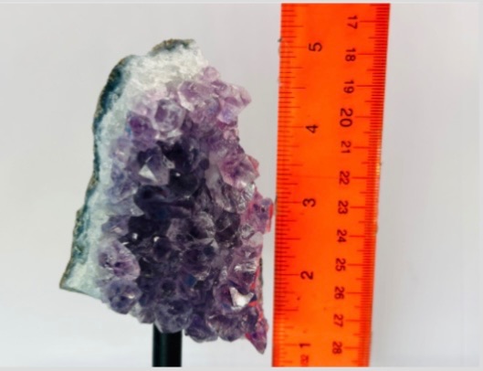 Photo 2 of 811823… 5”amethyst crystal rock on stand-height includes stand 