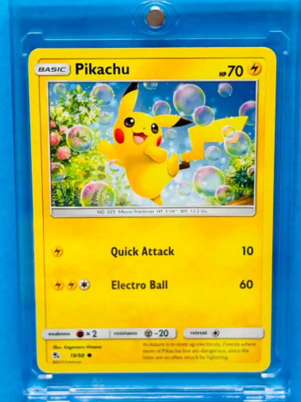 Photo 1 of 811894… Pokémon Pikachu card in hard plastic case 19/68