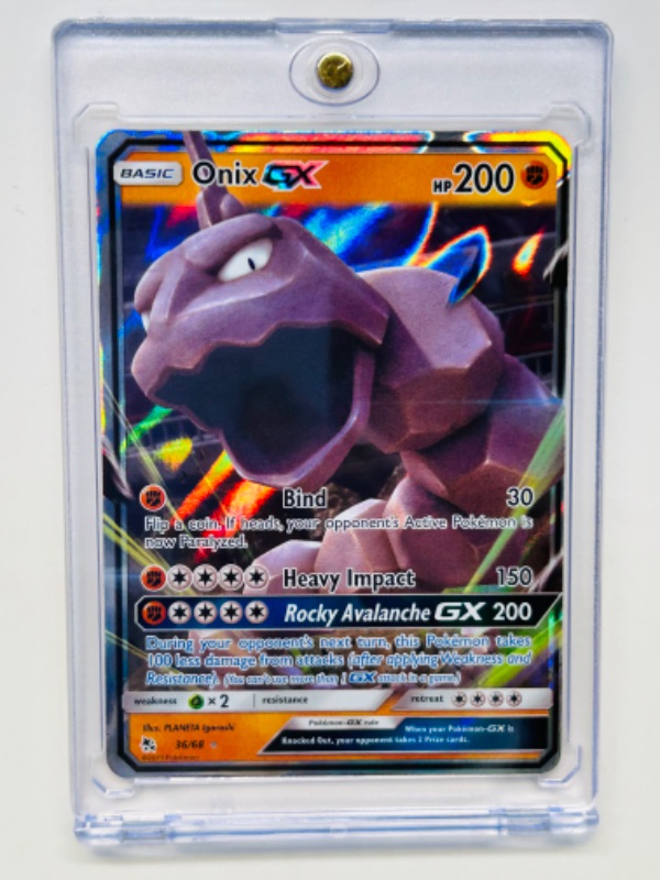 Photo 1 of 811904… PokémonGX holo card in hard plastic case 36/68