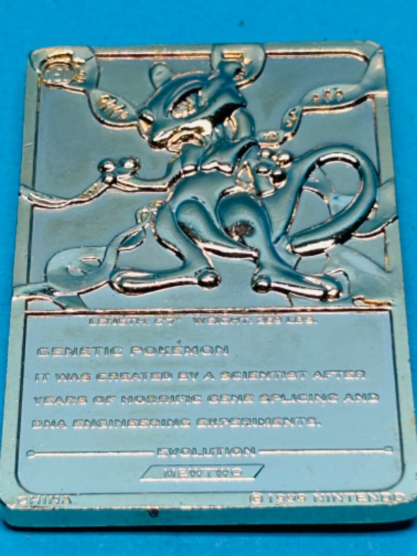 Photo 1 of 811923…1999 Pokémon Mewtwo gold plated bar card in 4x4” display box 