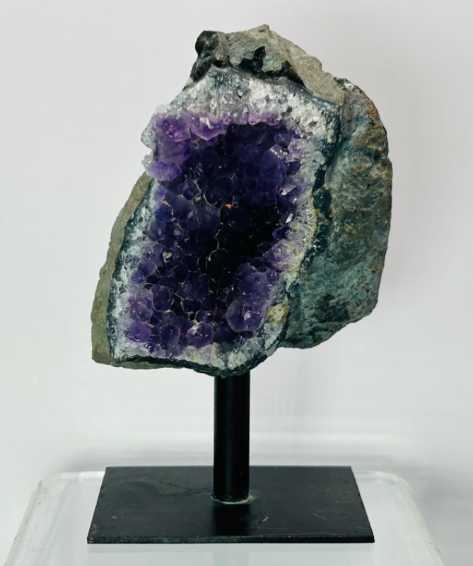 Photo 1 of 811987…5” amethyst crystal rock on display stand- height includes stand 