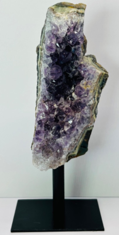 Photo 1 of 811988…7” amethyst crystal rock on display stand- height includes stand  