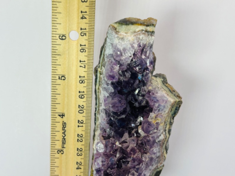 Photo 1 of 811988…7” amethyst crystal rock on display stand- height includes stand  