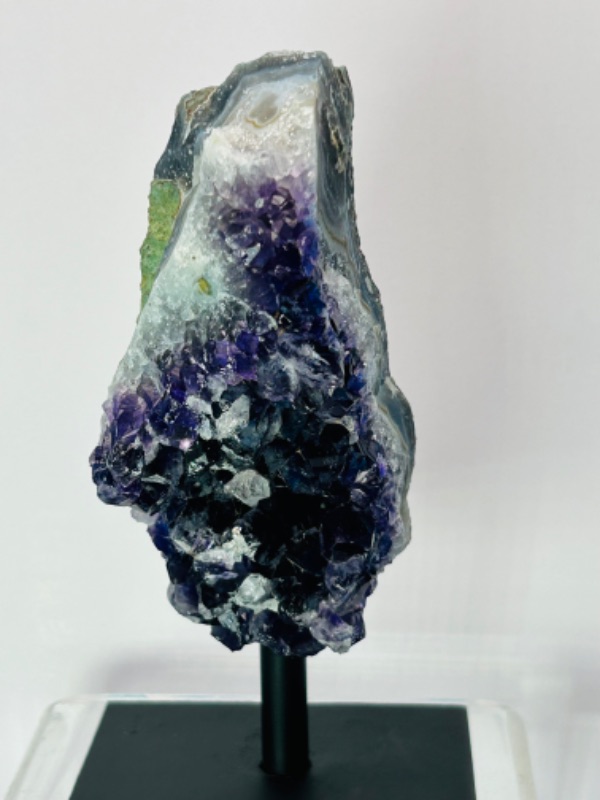 Photo 2 of 811989…6” amethyst crystal rock on display stand- height includes stand 