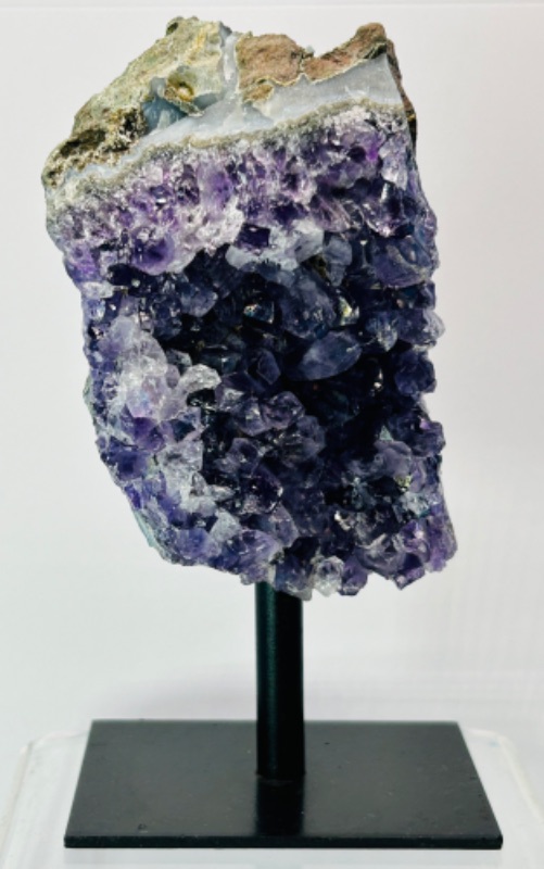 Photo 1 of 811990…6” amethyst crystal rock on display stand- height includes stand 