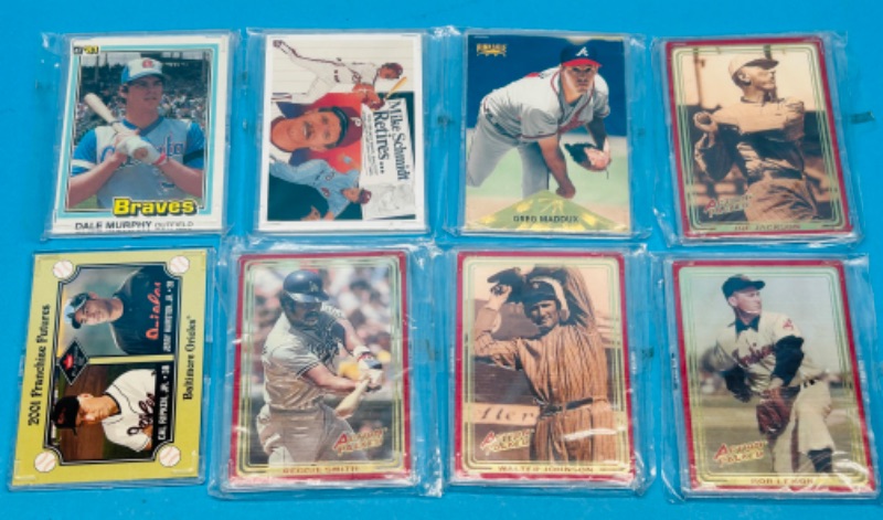 Photo 1 of 812011…8 sports cards  in hard plastic cases