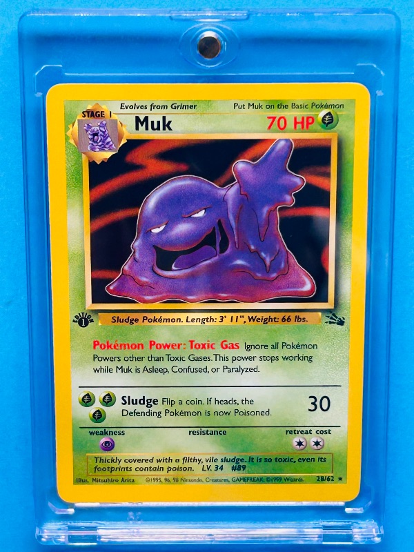 Photo 1 of 812052…Pokémon Muk  card in hard plastic case 28/62