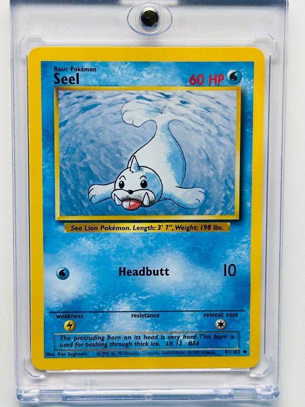 Photo 1 of 812054…Pokémon seel  card in hard plastic case  41/102