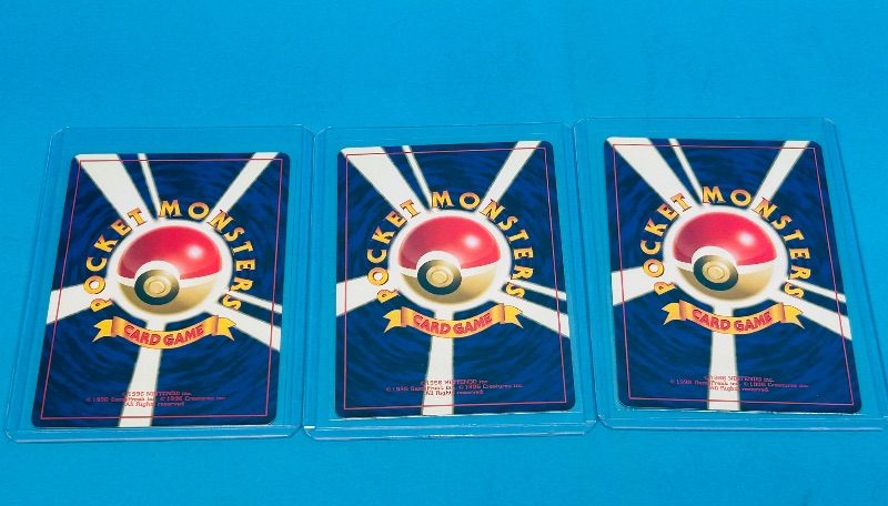 Photo 2 of 812056…3 Asian  Pokemon cards in hard plastic sleeves 