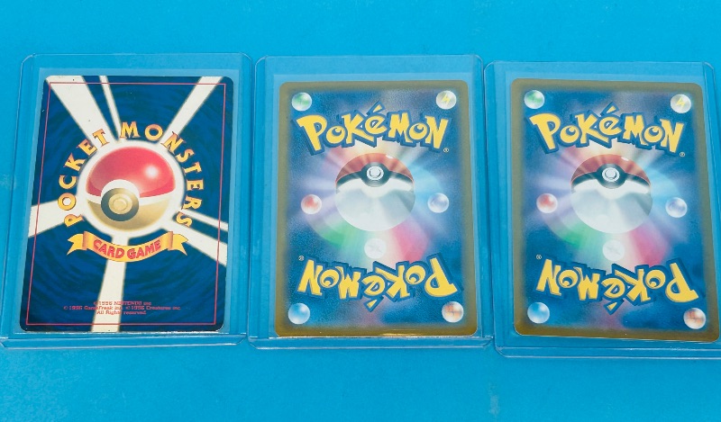 Photo 2 of 812057…3 Asian  Pokemon cards in hard plastic sleeves 