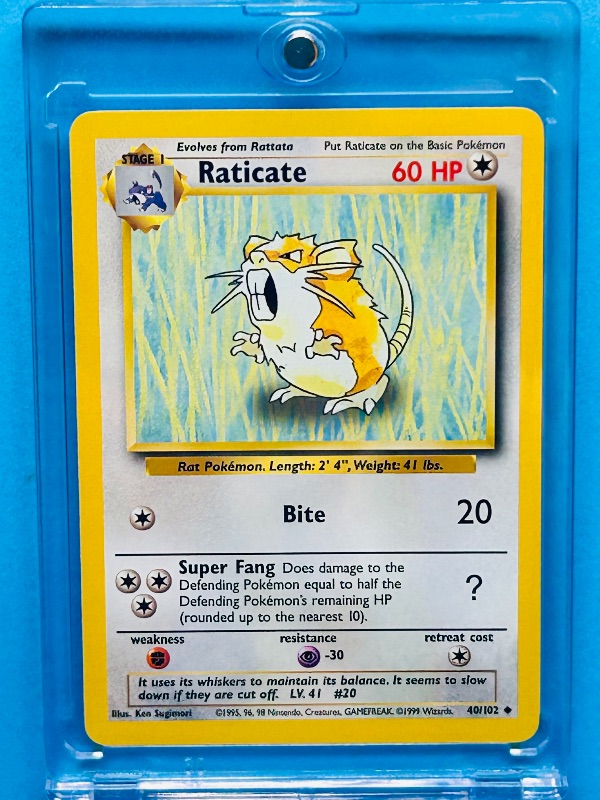 Photo 1 of 812062…Pokémon Raticate  card in hard plastic case  40/102