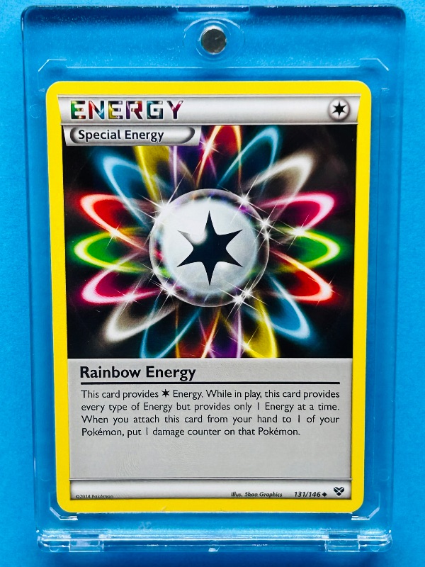 Photo 1 of 812119…Pokémon energy card 131/146 in hard plastic case 