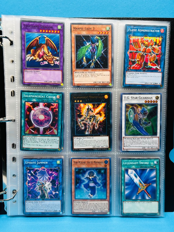 Photo 1 of 812256… final sale no returns/refunds -135 mixed Yu-Gi-Oh cards in binder -some holo