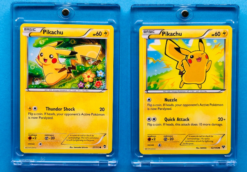 Photo 1 of 812277…2 Pokémon Pikachu cards in hard plastic cases