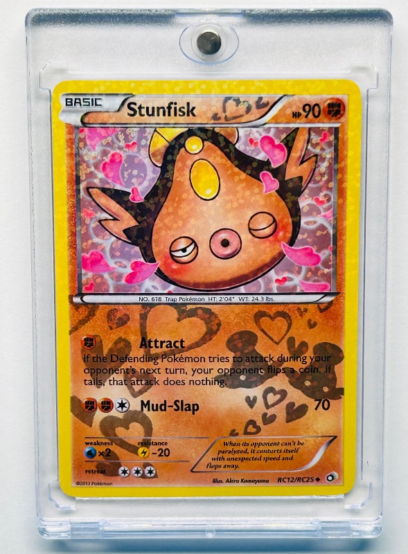 Photo 1 of 812285… Pokémon reverse holo card in hard plastic case Stunfisk