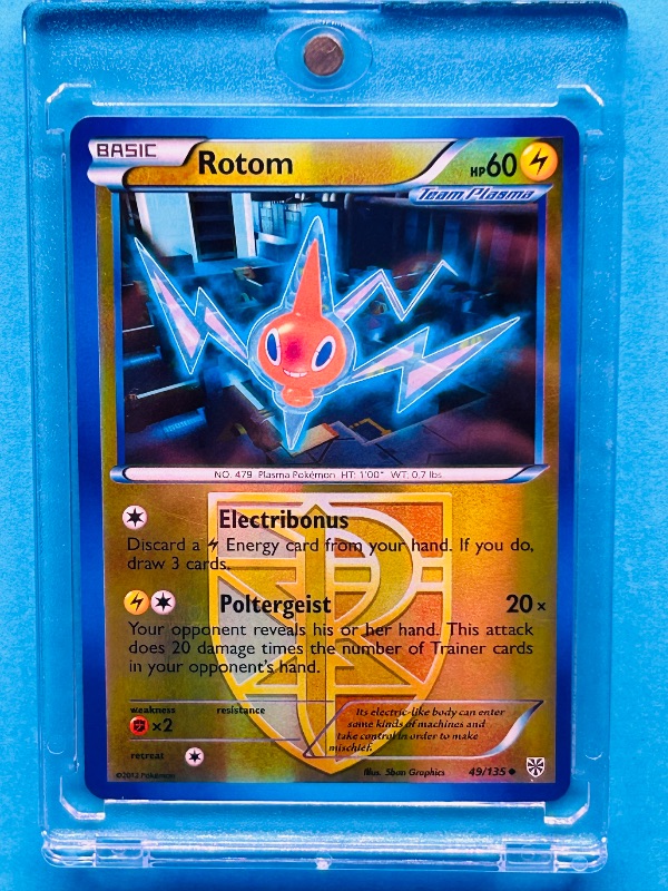 Photo 1 of 812286… Pokémon reverse holo card in hard plastic case Rotom 