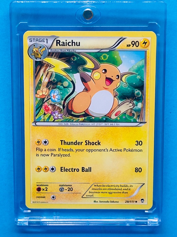 Photo 1 of 812302…  Pokémon card in hard plastic case Raichu 