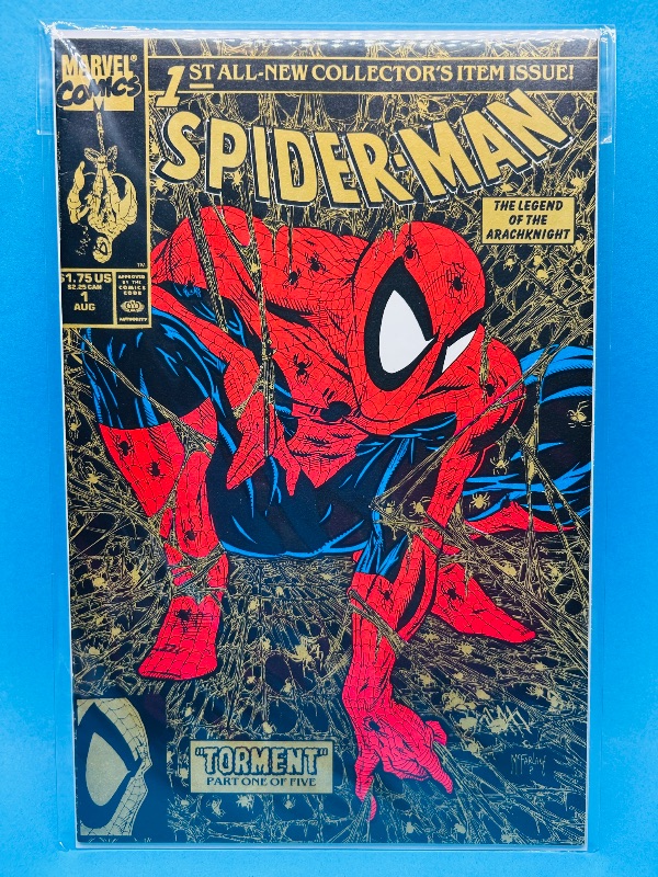 Photo 1 of 812451… gold edition Spider-Man comic #1 Torment in plastic sleeve 