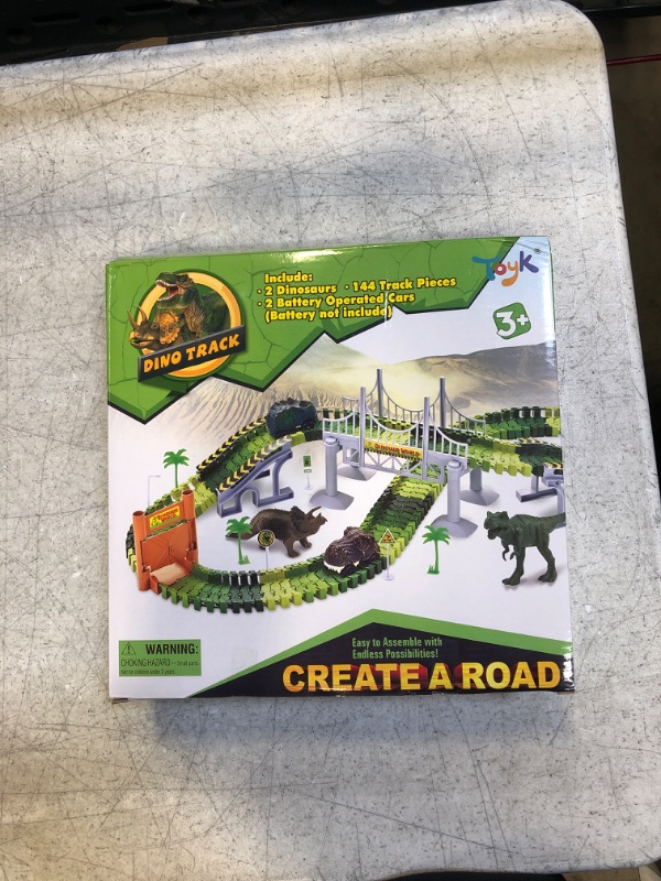 Photo 2 of Dinosaur Toys,Create A Dinosaur World Road Race,Flexible Track Playset and 2 pcs Cool Dinosaur car for 3 4 5 6 Year & Up Old boy Girls Best Gift Green