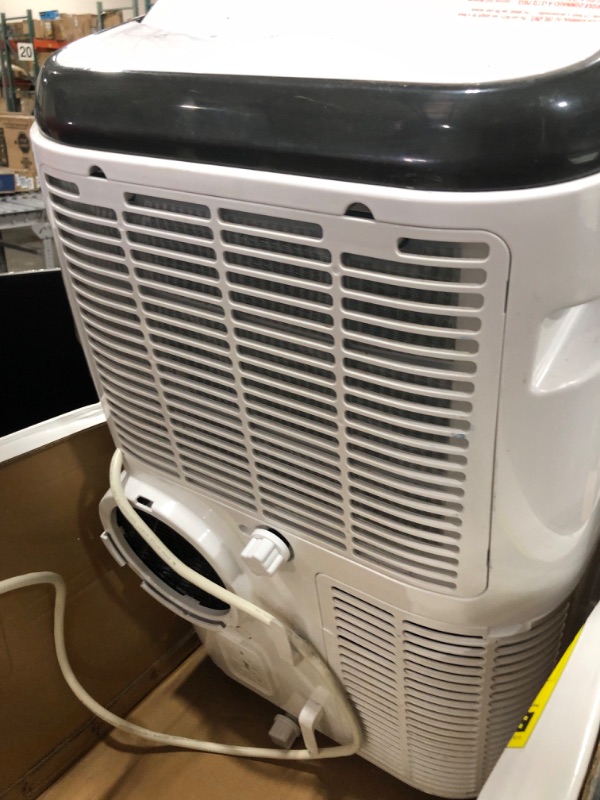 Photo 1 of BLACK+DECKER 14,000 BTU Portable Air Conditioner with Remote Control, White