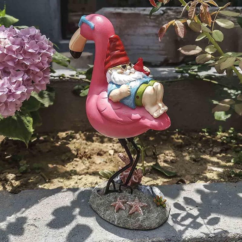 Photo 1 of Gnome Garden Statue, Funny Gnome Reclining on Flamingo Figurines, Resin Garden Gnomes Fall Decorations Outdoor for Patio Yard Lawn Porch, Ornament Gift
