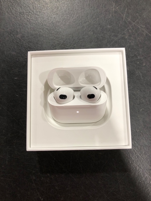 Photo 3 of Apple AirPods (3rd Generation) Wireless Ear Buds, Bluetooth Headphones, Personalized Spatial Audio, Sweat and Water Resistant, Lightning Charging Case Included, Up to 30 Hours of Battery Life Without AppleCare+