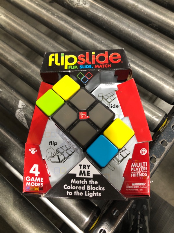 Photo 2 of  Flipslide Game Family Game 4 Game Modes Multi Player Puzzle Cube Moose Games Ages 8+ 