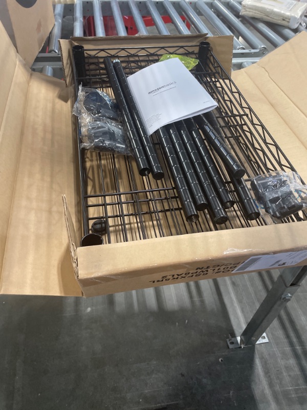 Photo 1 of Amazon Basics 3-Shelf Adjustable, Heavy Duty Storage Shelving Unit (250 lbs loading capacity per shelf), Steel Organizer Wire Rack, Black, 23.2"L x 13.4"W x 30"H 3-Shelf Narrow No Wheels Black