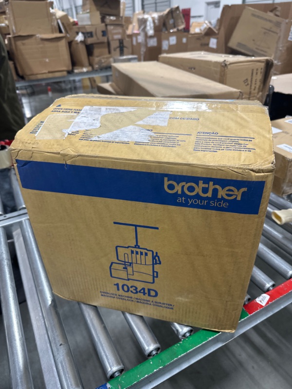 Photo 1 of Brother Serger, 1034D, Heavy-Duty Metal Frame Overlock Machine, 1,300 Stitches Per Minute, Removeable Trim Trap, 3 Included Accessory Feet,White