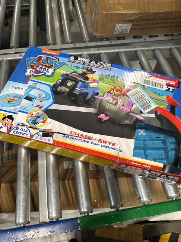 Photo 1 of Carrera First Paw Patrol - Slot Car Race Track - Includes 2 Cars: Chase and Skye - Battery-Powered Beginner Racing Set for Kids Ages 3 Years and Up, Paw Patrol - Adventure Bay