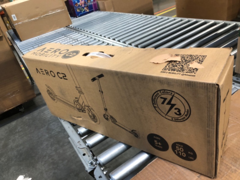Photo 1 of Aero Kick Scooter for Kids Ages 6-12 with Dynamic RGB Lights, Foldable and Height Adjustable, 2 Wheel Scooters for Kids 6 Years and up with Glowing Deck and Light up Clear Wheels Black