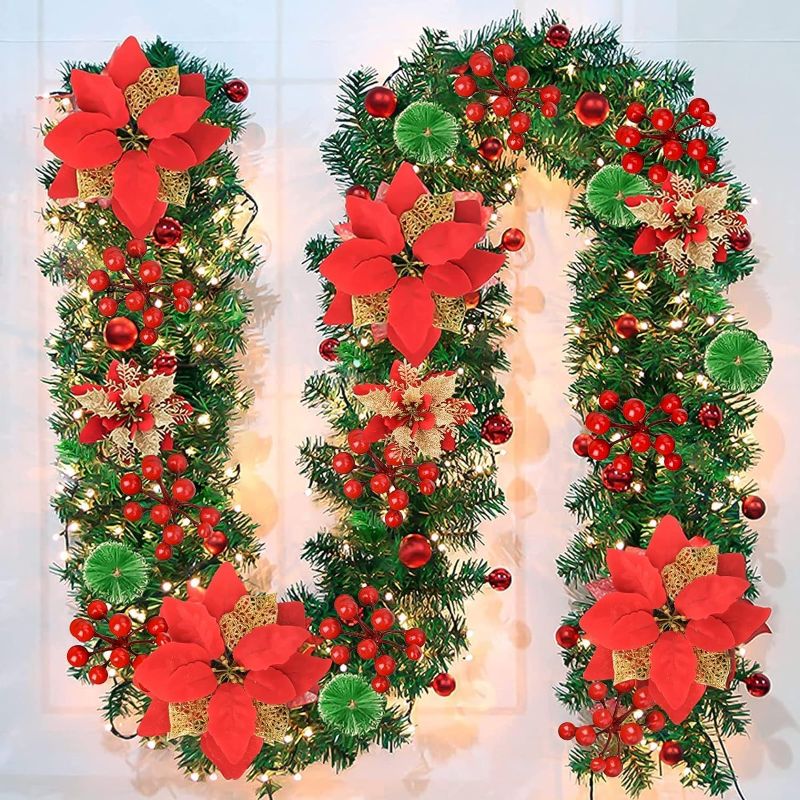 Photo 1 of 9FT Christmas Garland with Lights - Pre-Lit Artificial Green Christmas Garland for Stair Railings Mantle Decorations with Red Flowers, Berry Clusters Needle Pine and Balls, Winter Outdoor Indoor Decor