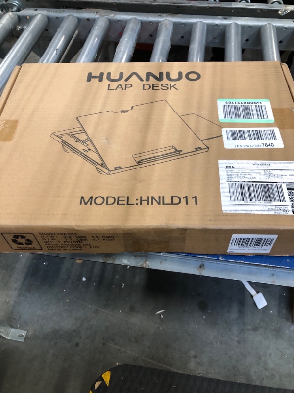 Photo 1 of Adjustable Lap Desk - with 6 Adjustable Angles, Detachable Mouse Pad, Dual Cushions Laptop Stand for Car Laptop Desk, Work Table, Lap Writing Board & Drawing Desk on Sofa or Bed by HUANUO