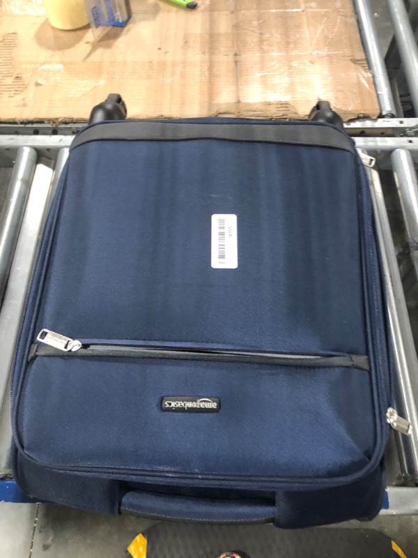 Photo 1 of Amazon Basics Softside Carry-On Spinner Luggage Suitcase - 21 Inch, Navy Blue Navy Blue 21-inch Suitcase
