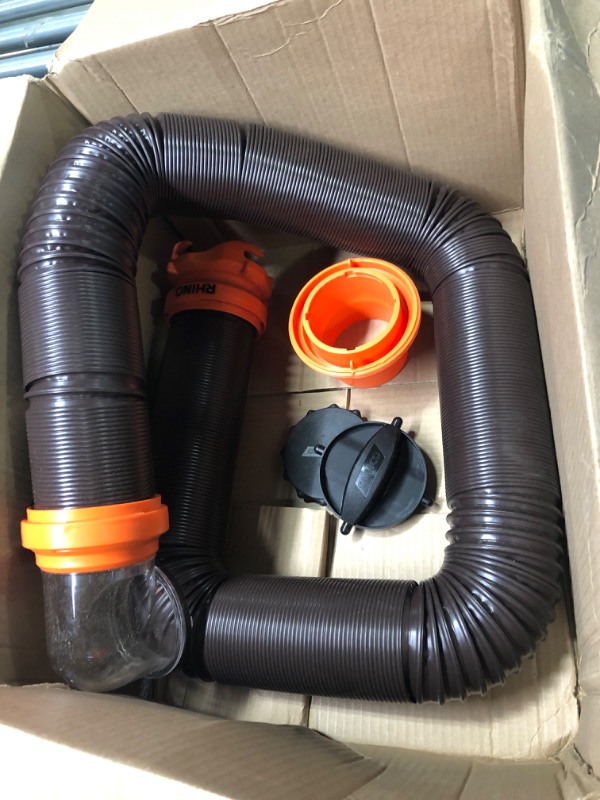 Photo 1 of Camco RhinoFLEX RV Sewer Hose Kit with Swivel Transparent Elbow and 4-in-1 Dump Station Fitting, Brown, 15 Feet (39770) 15ft Sewer Hose Kit Frustration-Free Packaging