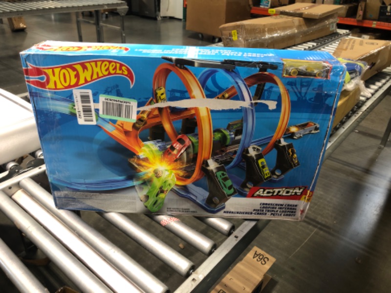 Photo 3 of Hot Wheels Track Set and Toy Car, Large-Scale Motorized Track with 3 Corkscrew Loops, 3 Crash Zones and Toy Storage??