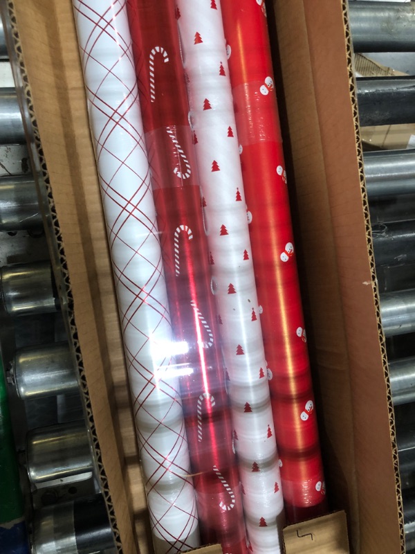 Photo 2 of American Greetings 120 sq. ft. Reversible White and Red Christmas Wrapping Paper Bundle for, Snowman, Tree, Candy Canes, Snowflakes (4 Rolls 30 in. x 12 ft.)