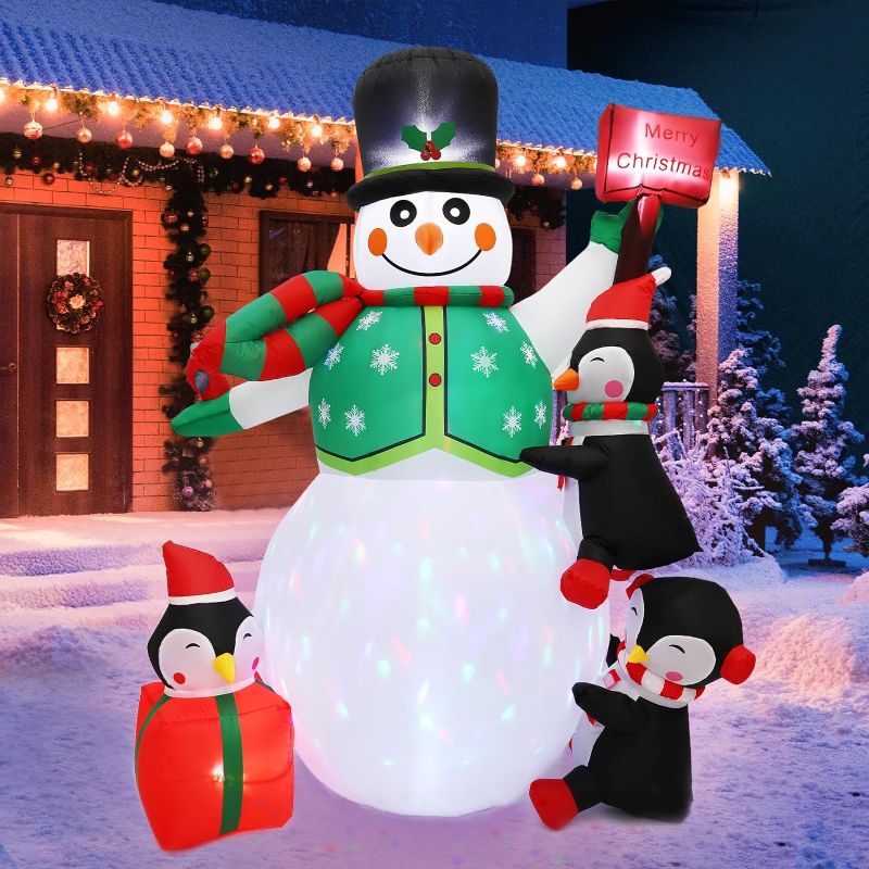 Photo 1 of 6FT Christmas Inflatable Snowman with Colorful Rotating LED Lights Outdoor Yard Decorations, 3 Penguin Blow Up Merry Christmas Decor for Yard Lawn Garden Indoor Outdoor Christmas Decorations