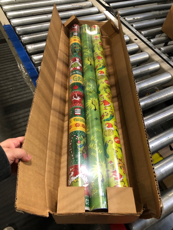 Photo 3 of American Greetings Christmas Wrapping Paper with Cut Lines Bundle, The Grinch (3 Rolls, 105 sq. ft.)