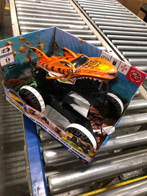 Photo 3 of Hot Wheels Monster Trucks, Remote Control Car, Monster Truck Toy with All-Terrain Wheels, 1:15 Scale Unstoppable Tiger Shark RC