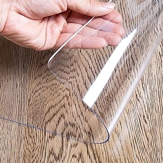 Photo 1 of OstepDecor Clear Desk Pad, 12 x 24 Inch Clear Desk Mat, 1.5mm Thick Plastic Table Protector, Small Desk Protector Mat Clear, Desk Mats on top of Desks, Clear Table Cover Protector for Writing Desk