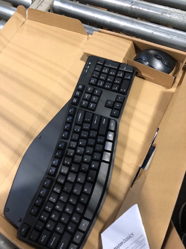 Photo 1 of Amazon Basics Ergonomic Wireless Keyboard Mouse Combo - QWERTY - Black
